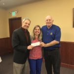 Mark Elworthy, District Administrator, and Lanora Heim, Director of Public Services, both of the Whitewater Unified School District, accepted a donation for summer school bus funding for ELL students. Whitewater Breakfast Club Treasurer Rick Norman presented the check on behalf of Kiwanis.