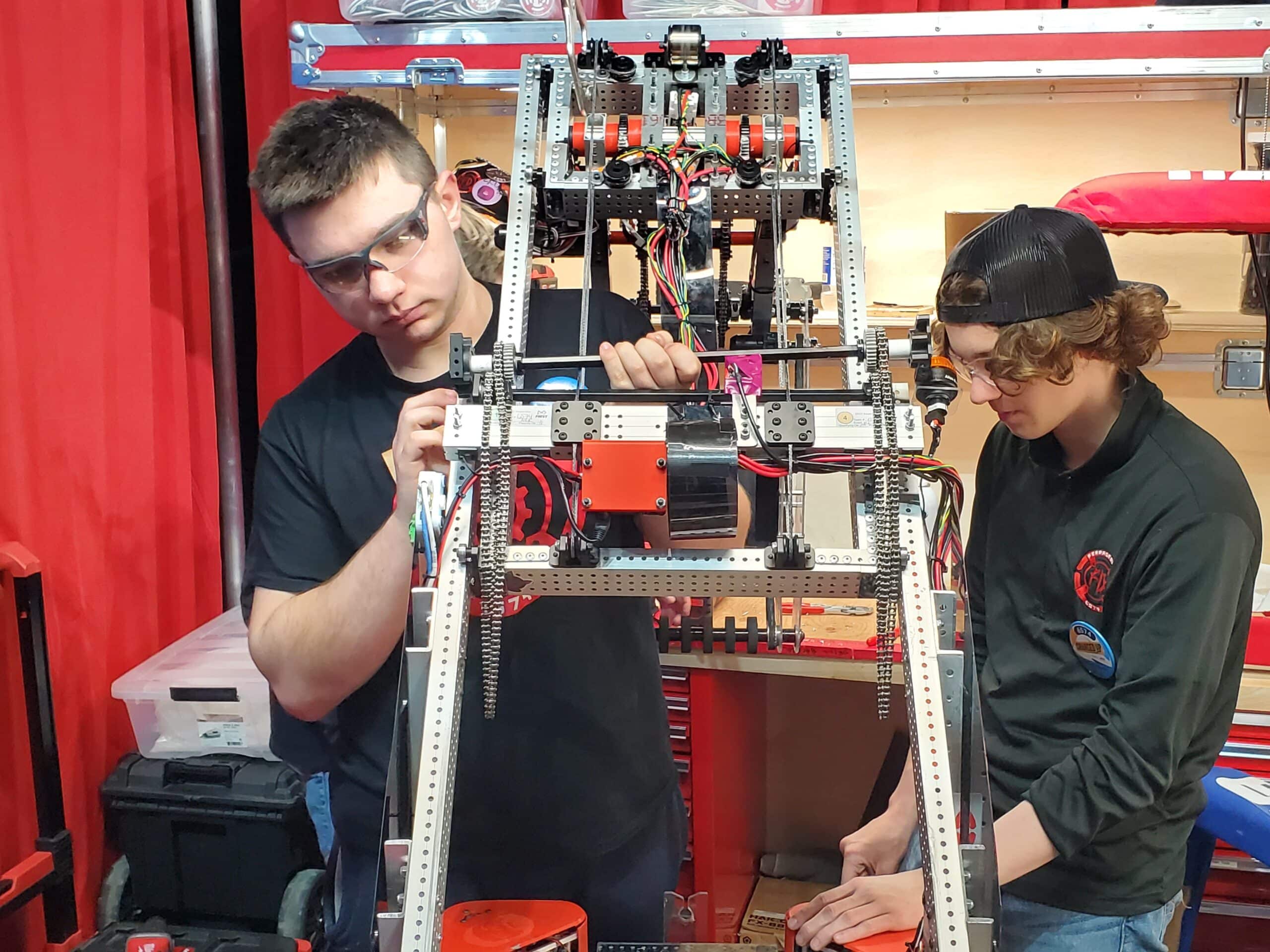 Mechanical Team Member Luc Pomazak works on the Elevator Between Matches