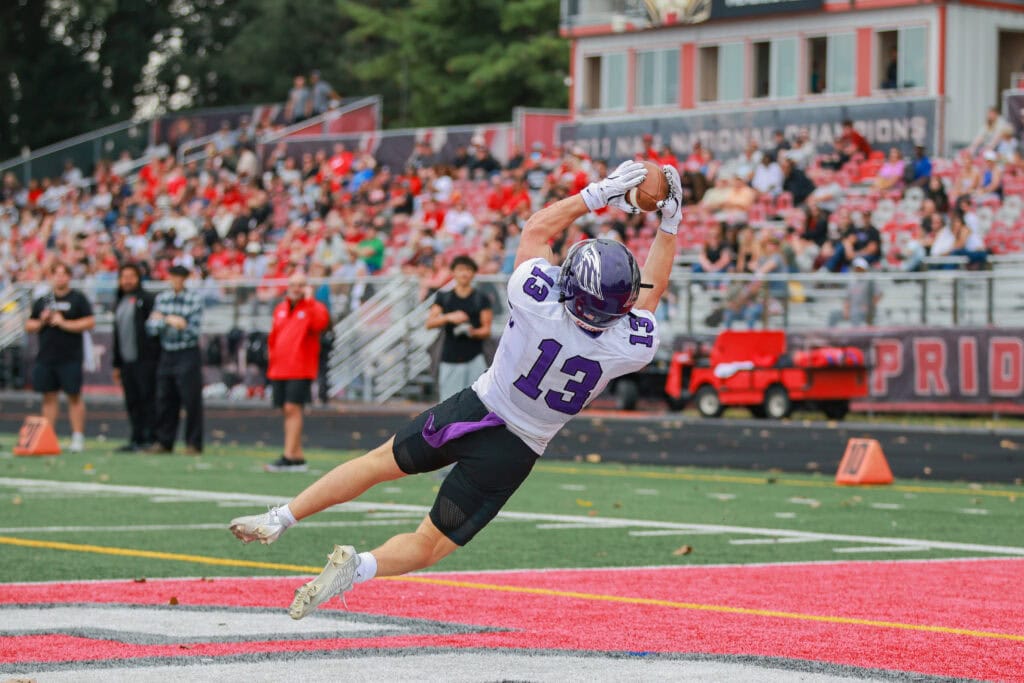 Blake Haggerty hauls in a touchdown catch at Saint Xavier. Credit - Olivia Zinanni