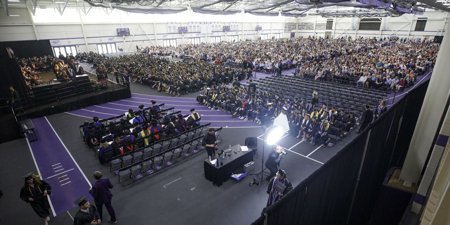 Students leave the stage with their diploma covers. UW-Whitewater held commencement ceremonies on Saturday, May 11, 2024, for more than 1,400 graduates. (UW-Whitewater photo/Craig Schreiner)