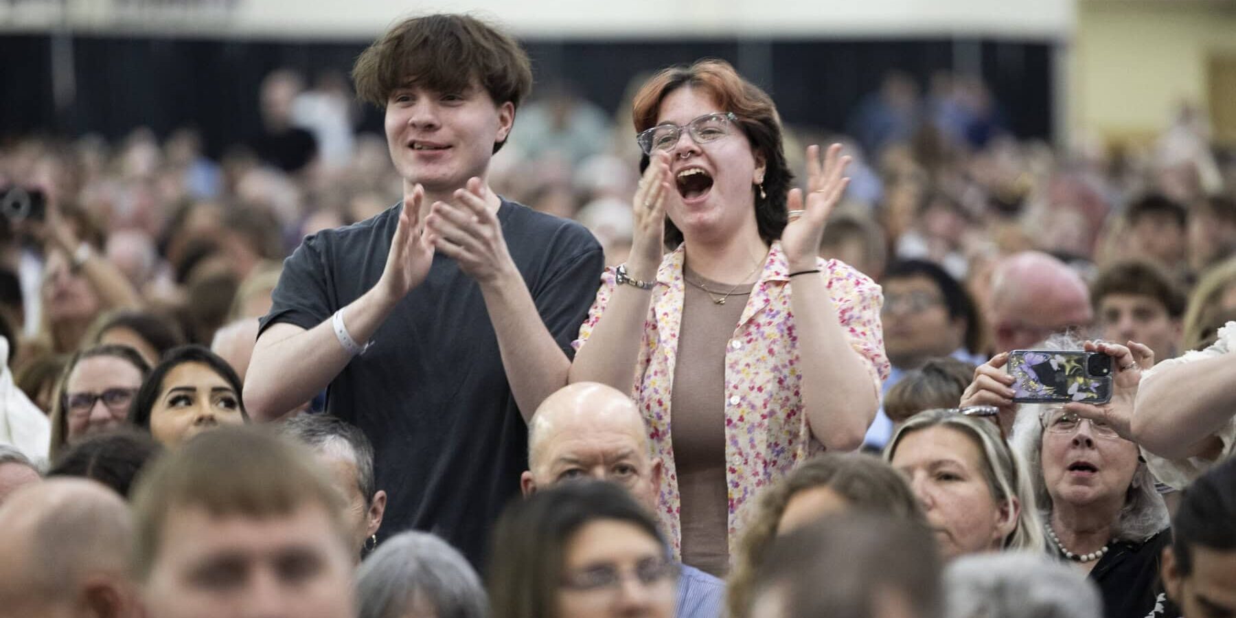 Family and friends clap and cheer for their graduates during the morning ceremony. UW-Whitewater held its spring commencement ceremonies on Saturday, May 16, 2026 in Kachel Fieldhouse. (UW-Whitewater photo/Craig Schreiner)